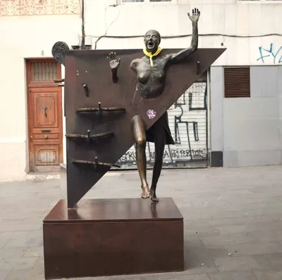 Book Character Transformed into a Statue in La Plaça del Diamant in Barcelona: La Colometa