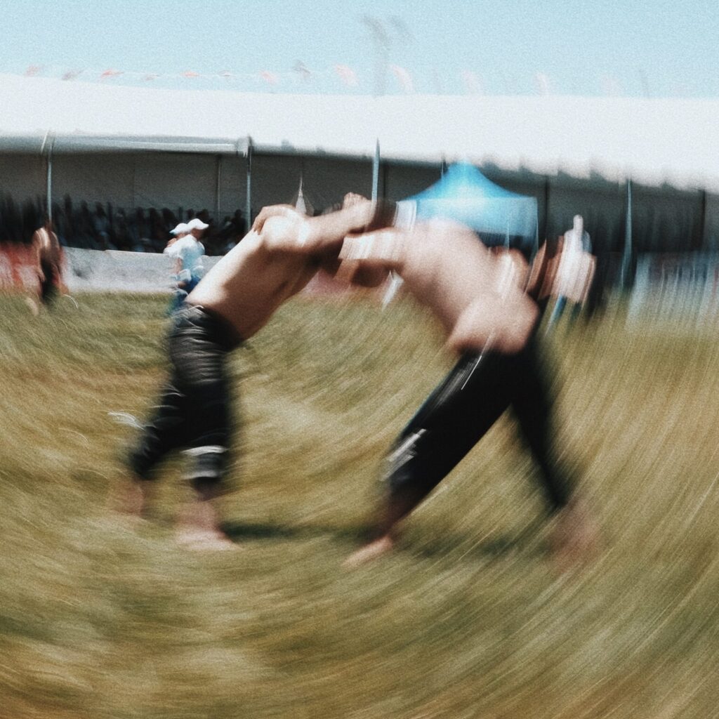 two men are wrestling