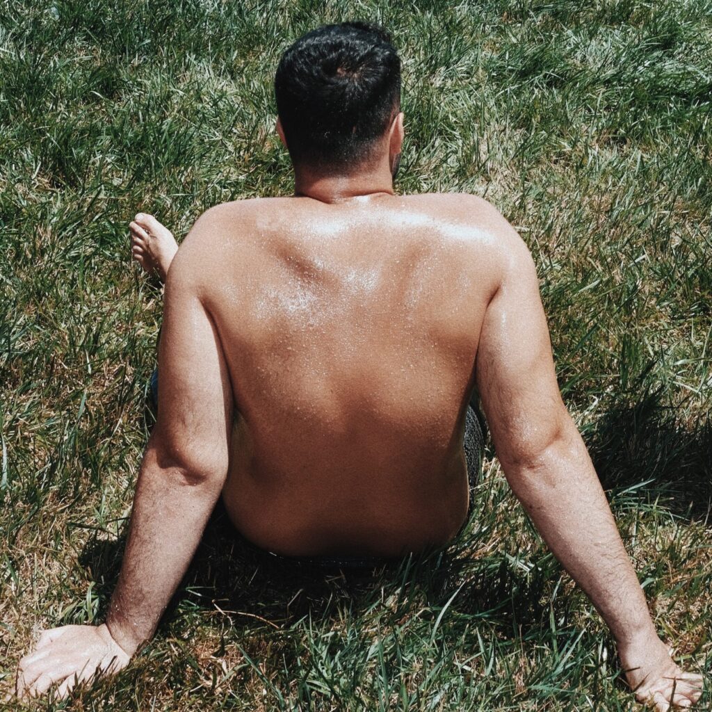 Wrestler man waiting for his turn with his back turned